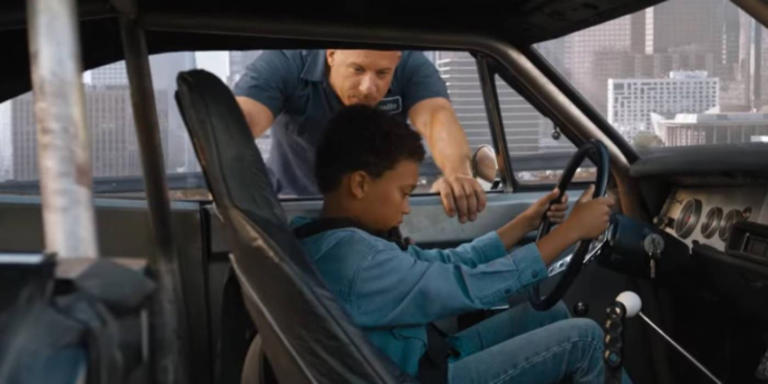Brian Toretto sits behind the wheel of a car in Fast X