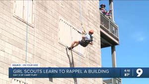 Girls Scouts rappel on Day 3 of Camp Fury