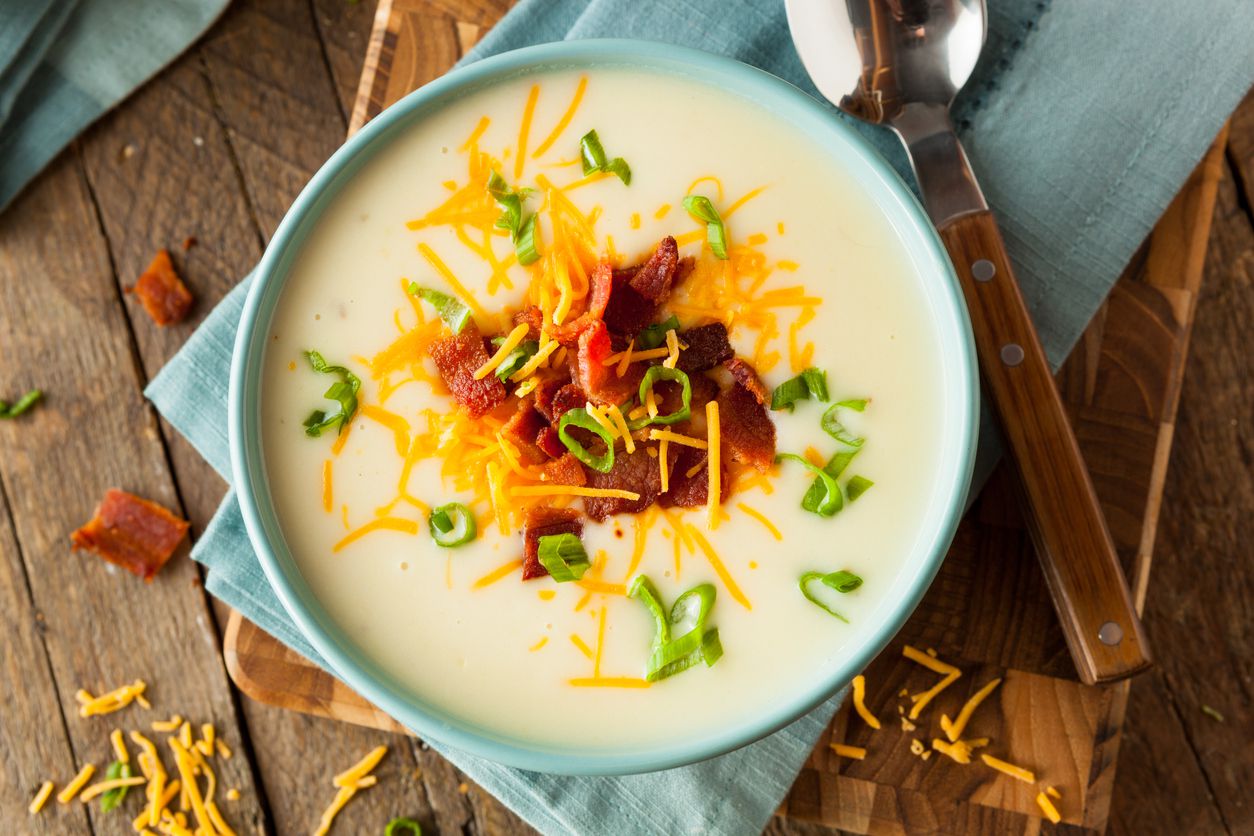 <p>No need to make a run for the northern border when you can warm up with this indulgent soup recipe from Le Cellier Steakhouse in Epcot's Canada pavilion. Among the crucial ingredients: bacon, white cheddar cheese, and butter. (Hey, we never said it was health food.)</p>  <p><a href="https://disneyparks.disney.go.com/blog/2020/05/disneymagicmoments-recipe-for-popular-canadian-cheddar-cheese-soup-from-le-cellier-steakhouse-at-epcot-first-time-release-on-disney-parks-blog/">Disney Parks</a></p>  <p><a href="https://blog.cheapism.com/canadian-foods/">18 Beloved Canadian Foods Every American Should Try</a></p>
