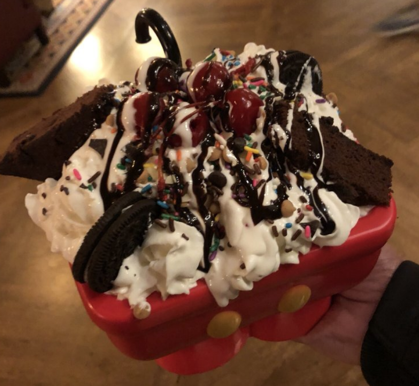 <p>How about a crazy-indulgent communal dessert to break up the long sludge of quarantine? This massive sundae from Disney's Beach Club Resort requires eight scoops of ice cream, two cupcakes, a brownie, a candy bar, several chocolate cookies, and a banana — and then there are at least a dozen separate toppings. Bring your Lactaid.</p>   <p><a href="https://disneyparks.disney.go.com/blog/2020/05/disneymagicmoments-cooking-up-the-magic-creating-our-over-the-top-kitchen-sink-sundae-at-home/">Disney Parks</a></p><p><a href="https://blog.cheapism.com/amazing-ice-cream-sundaes/">Indulgent Ice Cream Sundaes Across America</a></p>