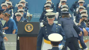 Biden tumbles on stage during AFA graduation