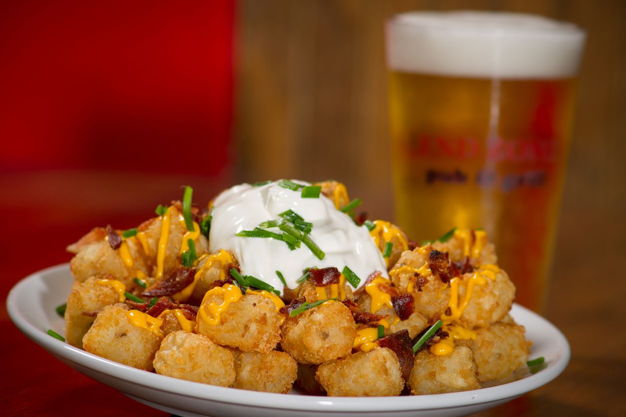 <p>If you need a bowl of comfort food, look no further than these totchos from Toy Story Land in Hollywood Studios. They're tater tots smothered in chili, queso, corn chips, and sour cream. Just don't wear your best white shirt when you dig in. </p>  <p><a href="https://disneyparks.disney.go.com/blog/2020/05/disneymagicmoments-cooking-up-the-magic-first-time-on-disney-parks-blog-recipe-for-totchos-from-woodys-lunch-box-at-disneys-hollywood-studios-yeehaw/">Disney Parks</a></p>  <p><a href="https://blog.cheapism.com/disney-on-a-budget-2017-15101/">26 Ways to Do Disney on a Budget</a> </p>