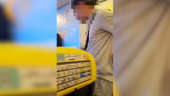 Moment Ryanair flight stormed after man caught smoking in plane toilet