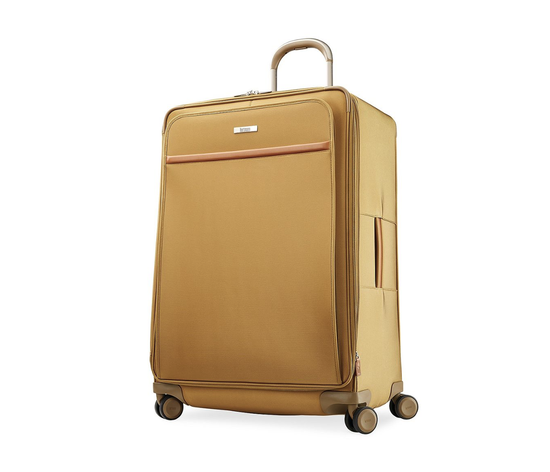 <p><strong>$599.99</strong></p><p>In the brand's classic safari shade, Hartmann's signature soft-sided suitcase is a timeless choice. The 12-position handle system coupled with the spinners provides ergonomic navigation, so you can meander easily through the airport.</p>