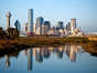 Buildings stand along the skyline of Dallas, Texas, U.S., on Wednesday, Nov. 11, 2009. Dallas is the third largest city in Texas and the eighth largest city in the U.S.