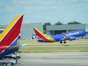 A Southwest Airlines plane takes off at Dallas Love Field Airport on July 25, 2022.