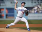 Dodgers rookie Michael Grove gave up four runs in five innings in L.A.'s 6-3 loss to the New York Yankees on Saturday. He struck out seven and walked none. "I thought overall, [Grove] was really good," Dodgers manager Dave Roberts said. ((Ashley Landis / Associated Press))