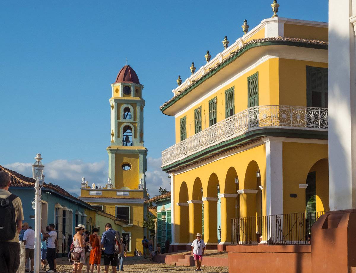 <p>A hidden gem in Cuba is the city of Trinidad. Founded back in 1514, the city is home to The Plaza Mayor, an open-air museum of Spanish Colonial Architecture. Close to the Valle de Los Ingenios, Trinidad was once at the center of Cuba's sugar production.</p> <p>Now, travelers will want to come here to see the magnificent red-domed tower of the Church and Monastery of Saint Francis, as well as the Church of the Holy Trinity.</p>