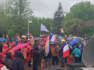 Despite the rain and cold, more than 100 people showed up in Moncton to support Policy 713