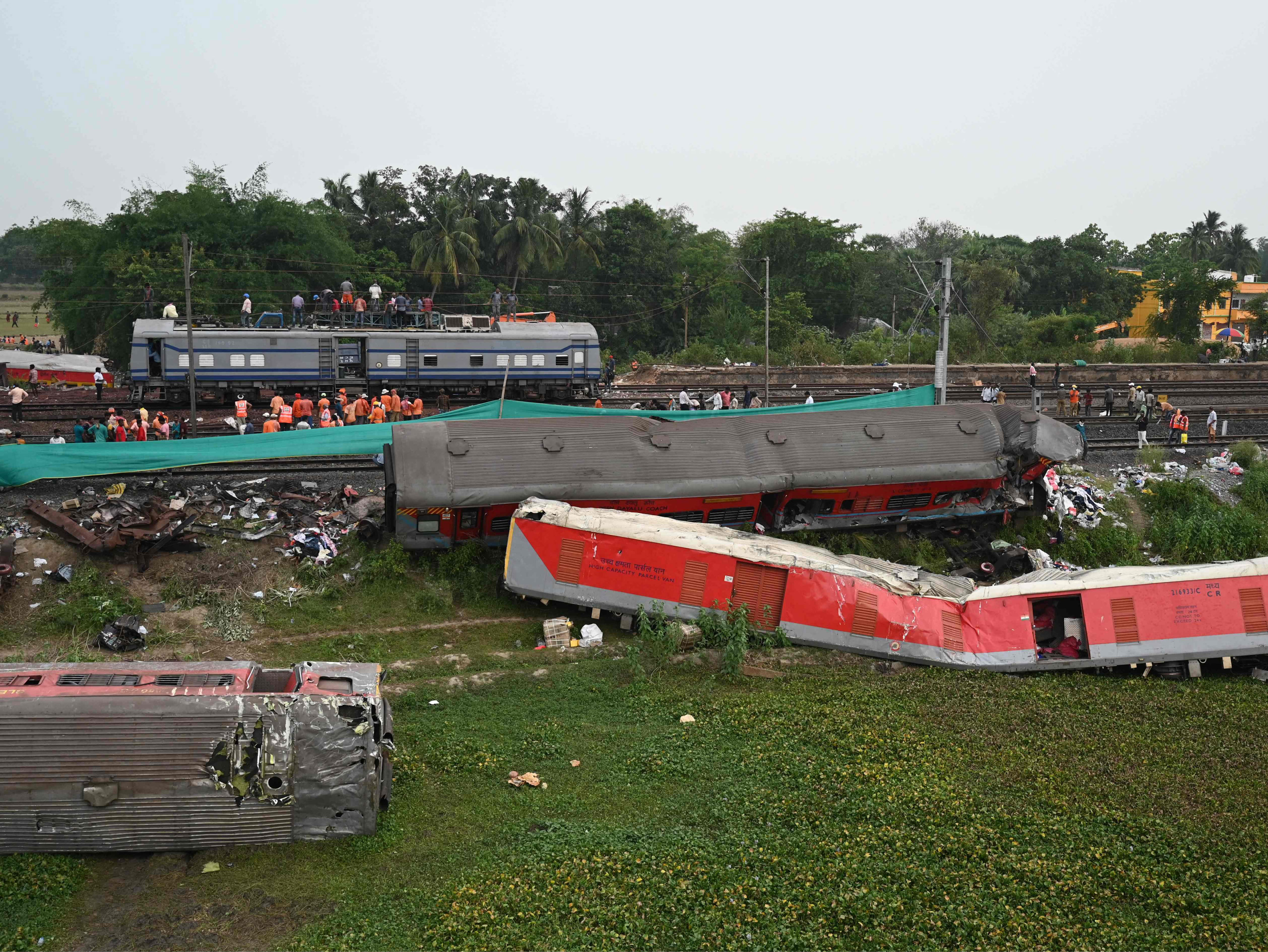 families in desperate hunt for loved ones as india’s deadly rail crash wreckage cleared