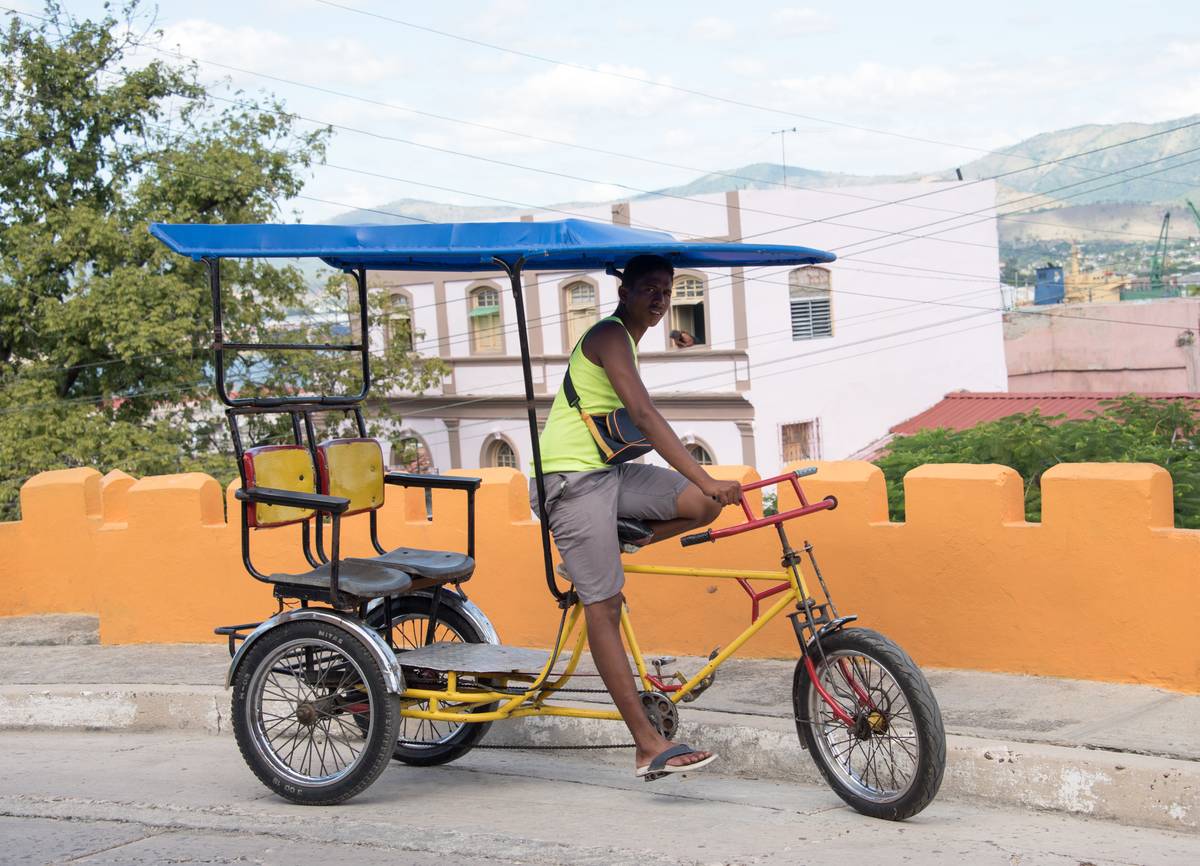 <p>With so many different modes of transportation, there is nothing quite like the bicitaxi. Dating back to the "special period," these bike-taxi's are pretty much just as they sound -- a tricycle-looking bike with two back seats and a person "driving" in the front.</p> <p>Bicitaxi's came in very handy in Cuba when fuel was in short supply since they have no need for gas and only need a whole lot of will and foot power.</p>