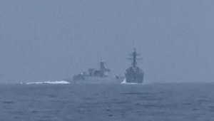 Moment Chinese warship nearly hits US destroyer