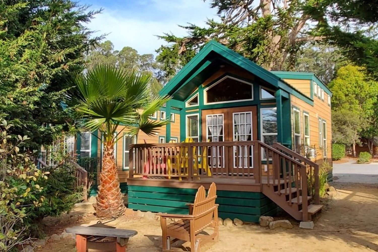 <p>This is not your grandpa's KOA. Many of the classic KOA campgrounds across the United States are getting glam makeovers, including <a href="https://koa.com/campgrounds/santa-cruz/?gad=1&gclid=Cj0KCQjw7PCjBhDwARIsANo7CgmgLimDawEln-N2l_LRQDzYygIgVN1phVVSZRTGrJqwIa_CTV66hXwaAjkNEALw_wcB&gclsrc=aw.ds" rel="noopener noreferrer">this one</a> on California's central coast in Watsonville. It's perfect for <a href="https://www.rd.com/article/camping-with-dogs/" rel="noopener noreferrer">camping with pets</a>, and it's still possible to rough it in a regular tent or pull up in an RV, should you want to. But since glamping means you don't have to sleep on uneven ground, you can rent a camping cabin and walk from the private patio through French doors to snooze in a four-poster bed with real sheets.</p> <p>The new camping cabins also feature a Keurig coffee bar and refrigerator. Not on a romantic rendezvous for two? Deluxe cabins and Airstreams sleep four or six and have cable and bathrooms inside. It's a mile from Manresa State Beach, but the pool, a train, outdoor movies, jumping pillow, tie-dyed T-shirt making and palm-tree climbing give families multiple reasons to kick it within KOA walls.</p> <p class="listicle-page__cta-button-shop"><a class="shop-btn" href="https://koa.com/campgrounds/santa-cruz/?gad=1&gclid=Cj0KCQjw7PCjBhDwARIsANo7CgmgLimDawEln-N2l_LRQDzYygIgVN1phVVSZRTGrJqwIa_CTV66hXwaAjkNEALw_wcB&gclsrc=aw.ds">Book Now</a></p>