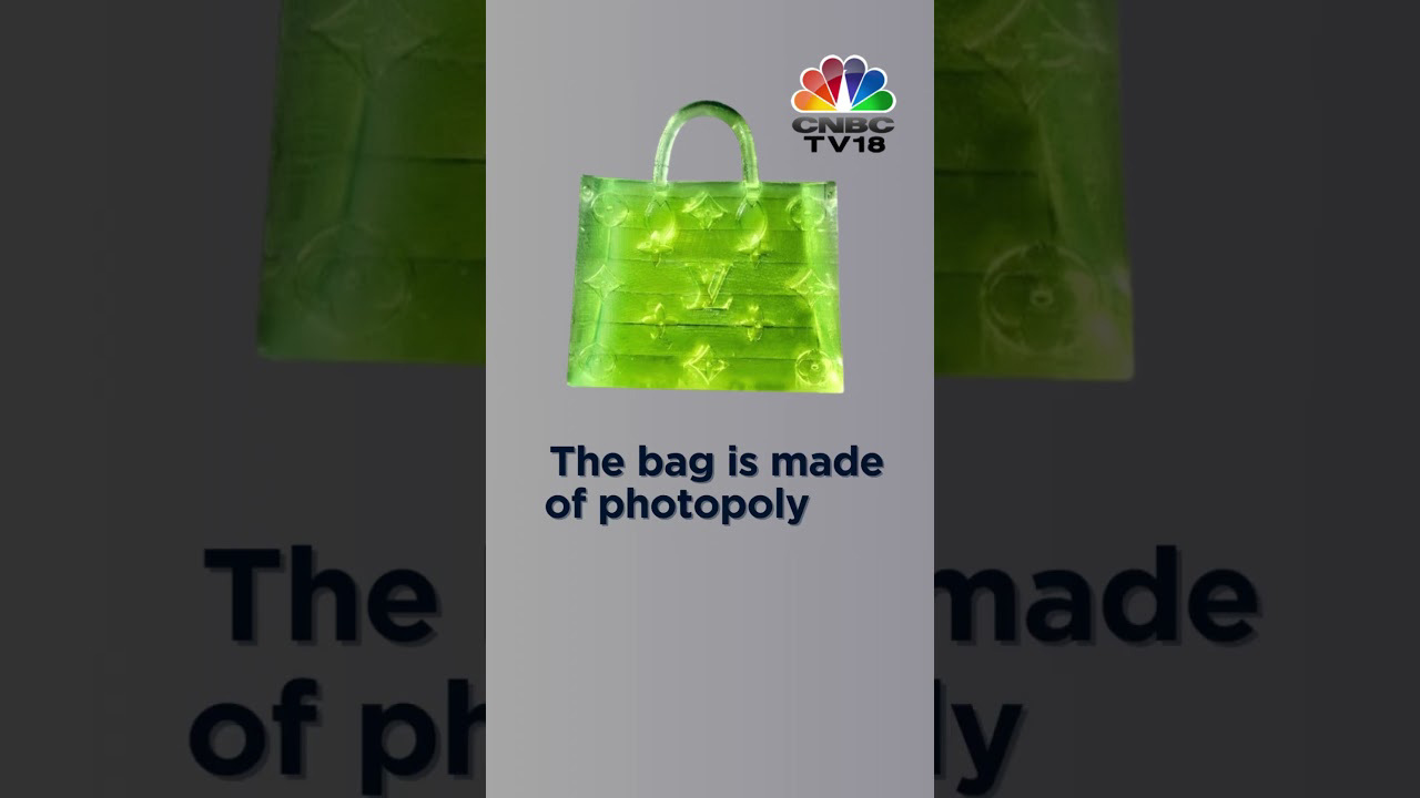 A microscopic, knockoff Louis Vuitton handbag smaller than a grain