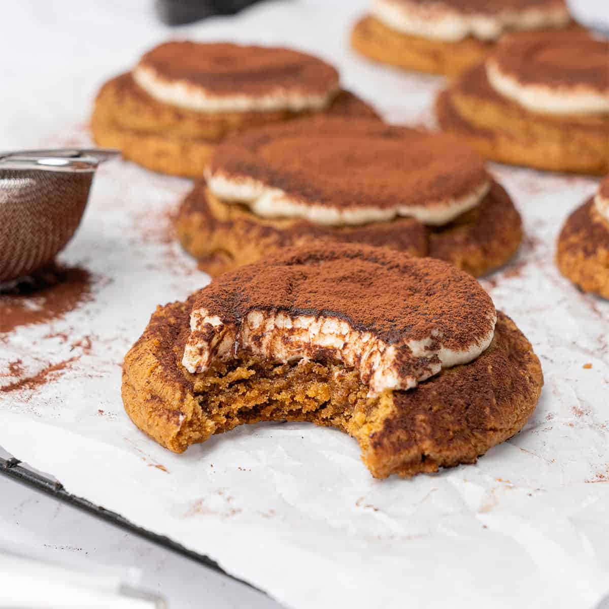 <p>These delicious, coffee-flavored <a href="https://www.spatuladesserts.com/tiramisu-cookies/"><strong>tiramisu cookies</strong></a> are the perfect after-dinner treat, dessert table addition, or compliment to your morning cup of coffee. A delightful twist on the classic Italian dessert, this easy tiramisu cookie recipe combines espresso powder and sweet mascarpone frosting topped with cocoa powder.</p> <p><strong>Go to the recipe: <a href="https://www.spatuladesserts.com/tiramisu-cookies/">Tiramisu Cokies</a></strong></p>