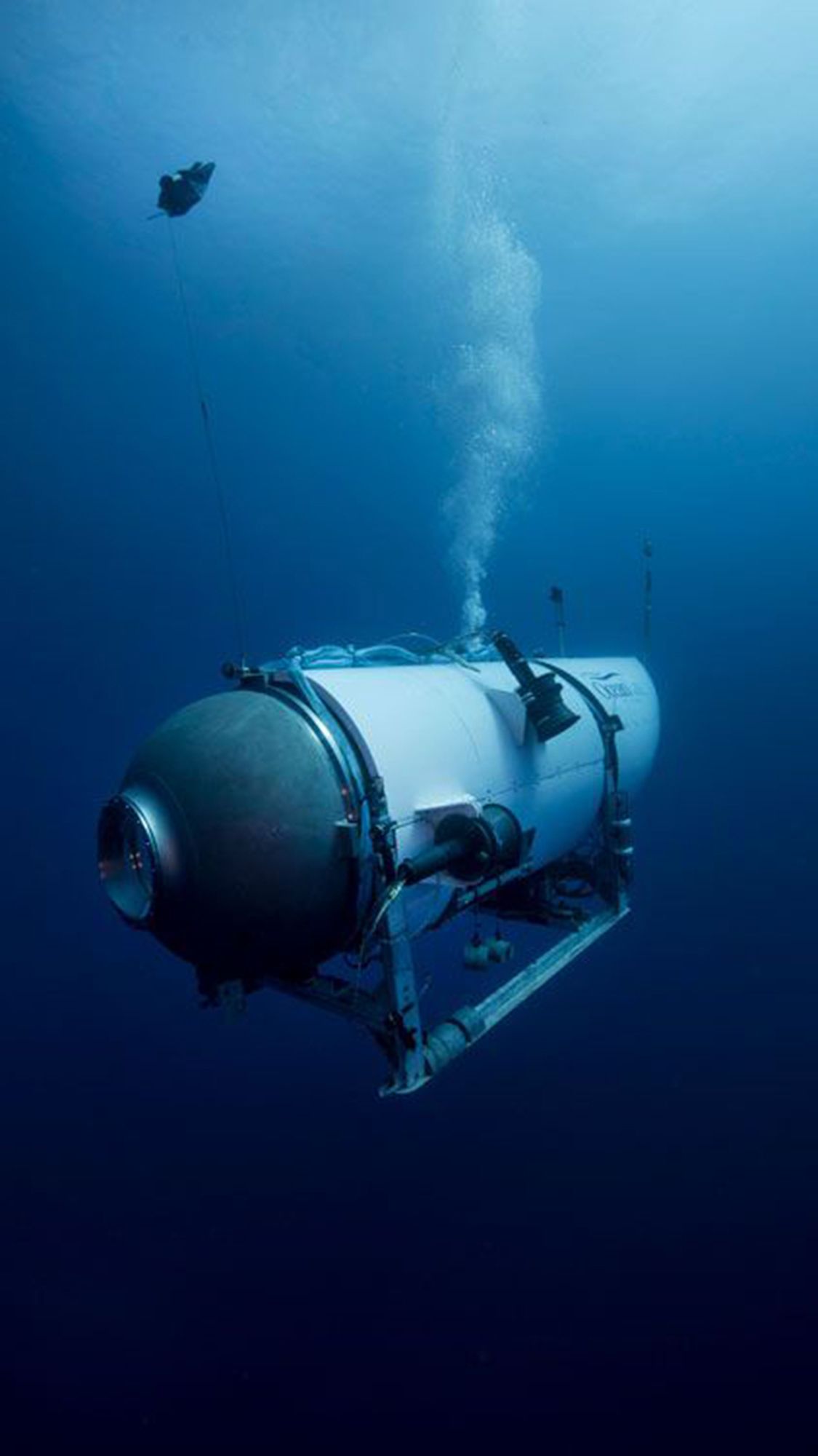 titan passenger suleman dawood took rubik's cube on board sub to break world record
