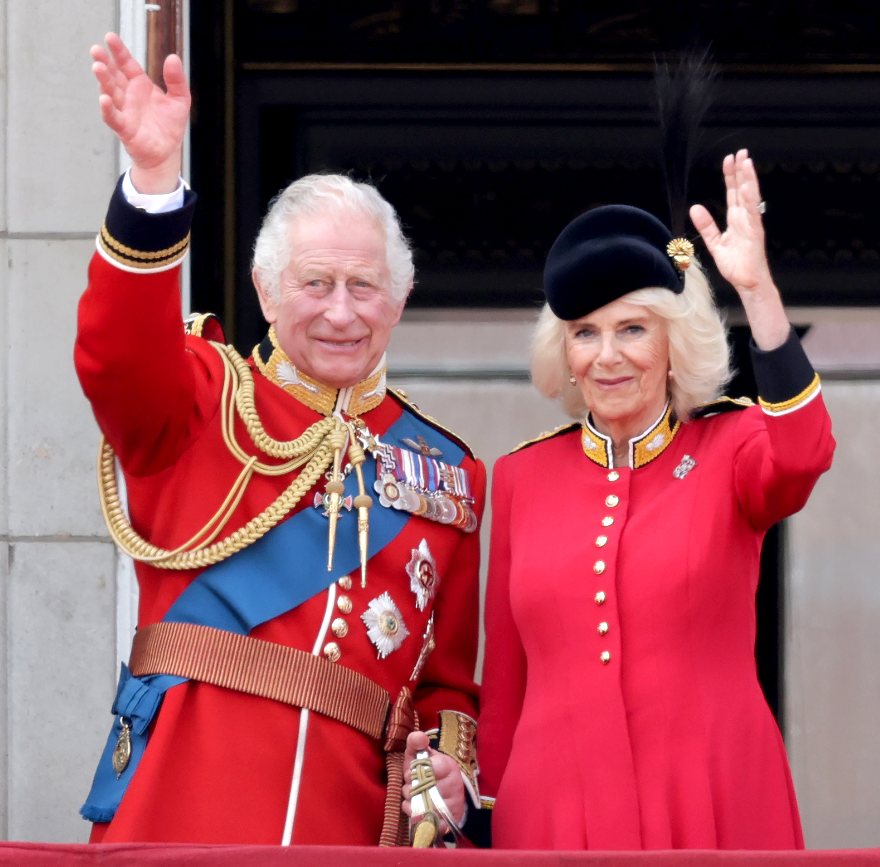 <p>King Charles III and Queen Camilla waved to the crowd from the balcony of Buckingham Palace in London while watching a fly-past of Royal Air Force aircraft during <a href="https://www.wonderwall.com/celebrity/royals/trooping-the-colour-2023-king-charles-iii-celebrates-the-first-of-his-reign-752078.gallery">Trooping the Colour</a> -- the first of his reign -- on June 17, 2023. Trooping the Colour is a traditional parade held to mark the British sovereign's official birthday.</p>