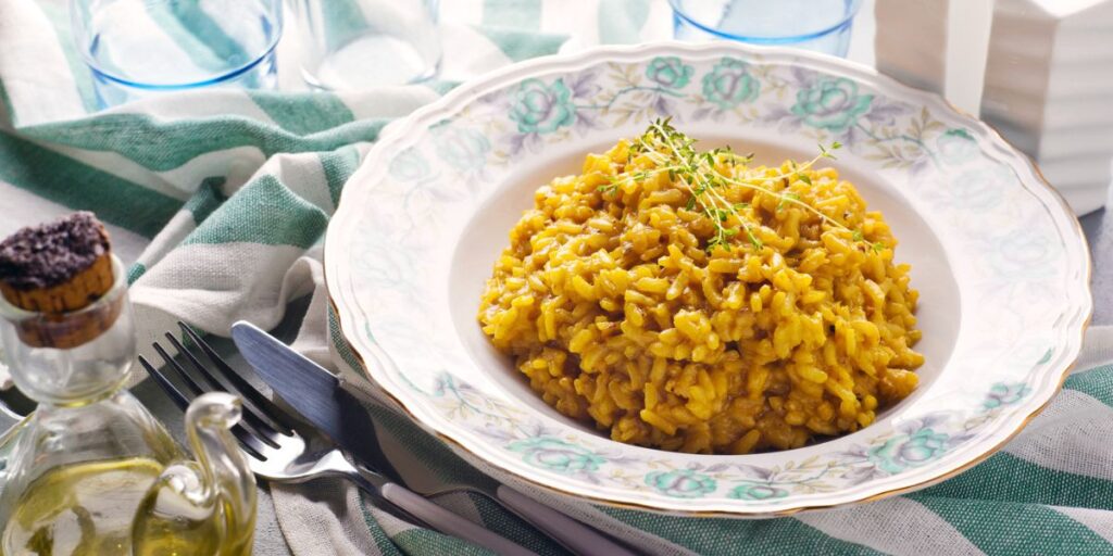 <p>A creamy rice dish made with Arborio rice, saffron, butter, and Parmesan cheese, originating from Milan.</p>