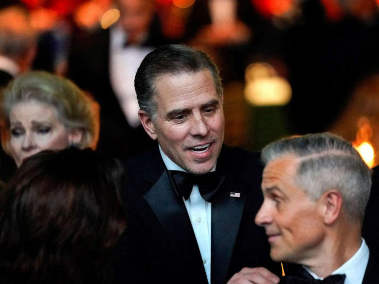 Hunter Biden speaks to a person during an official state dinner hosted by President Joe Biden for India's Prime Minister Narendra Modi at the White House in Washington, D.C., on June 22, 2023.