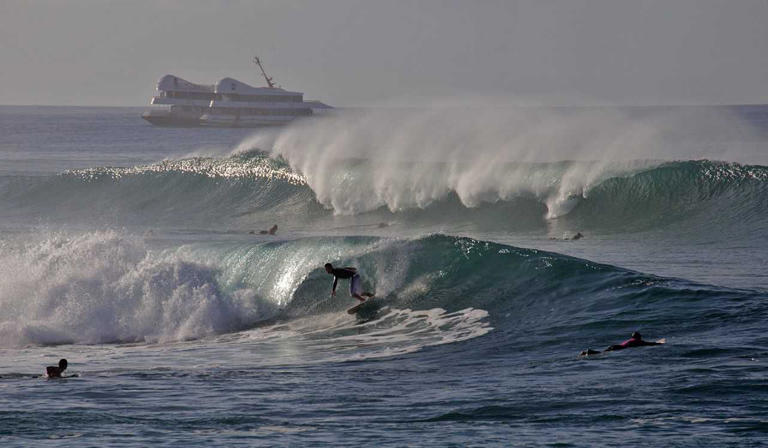 File photo of high surf taken at the "Kewalos" surf spot on the south shore of Oahu.
