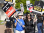 Meredith Stiehm, left, president of Writers Guild of America West, and Fran Drescher, president of SAG-AFTRA, take part in a rally outside of Paramount Pictures on May 8 in Los Angeles.