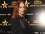 'Queen of Oz' actress Catherine Tate admits returning to 'Doctor Who' as Donna Noble meant her new BBC One sitcom was delayed.