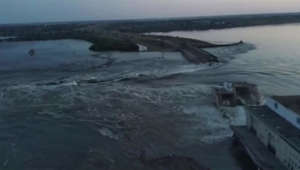 Floodwaters unleashed after blasts at dam in Ukraine