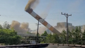 Smokestacks implode at closed coal-fired power plant, damaging nearby homes