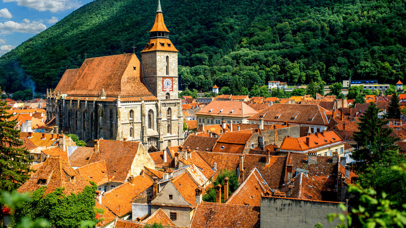 The biggest city in Romania’s enchanting Transylvania region, Brasov sits nestled at the base of rolling mountains and owns a cityscape famed for its spires, watchtowers and unique “Hollywood-style” sign. Skinny St. Nicholas Cathedral and its spindly spires looks like something straight out of a fairytale and the entire town is sure to keep you full of smiles for days with its safe and welcoming atmosphere.