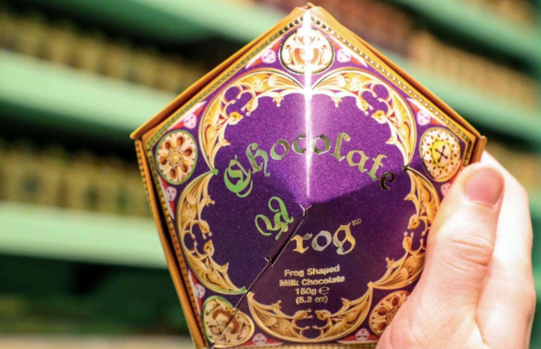 <p>The chocolate frog is arguably one of the most famous snacks from the Hogwarts Express lunch trolley. This riff on the idea is made from milk chocolate and, just like in the movie, comes packaged in a classic violet and gold Honeydukes box with a collectable wizard card. Fans will love reading about Godric Griffindor, Albus Dumbledore, Gilderoy Lockhart or Rowena Ravenclaw while they enjoy their sweet treat.</p>