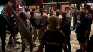 West Ham players dance and celebrate with fans outside Prague hotel