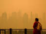 New York Shrouded In Orange Haze From Canadian Wildlife Smoke