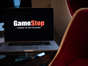 The GameStop Corp. logo on a laptop computer arranged in Hastings-On-Hudson, New York, U.S., on Friday, Jan. 29, 2021. GameStop Corp. advanced on Friday and was on track to recoup much of Thursday’s $11 billion blow after Robinhood Markets Inc. and other brokerages eased trading restrictions on the video-game retailer.