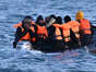 Small boat filled with migrants tries to cross the English Channel