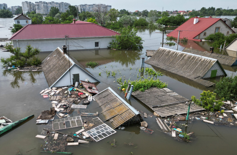 ukraine's zelensky visits flood-hit area after kakhovka dam collapse