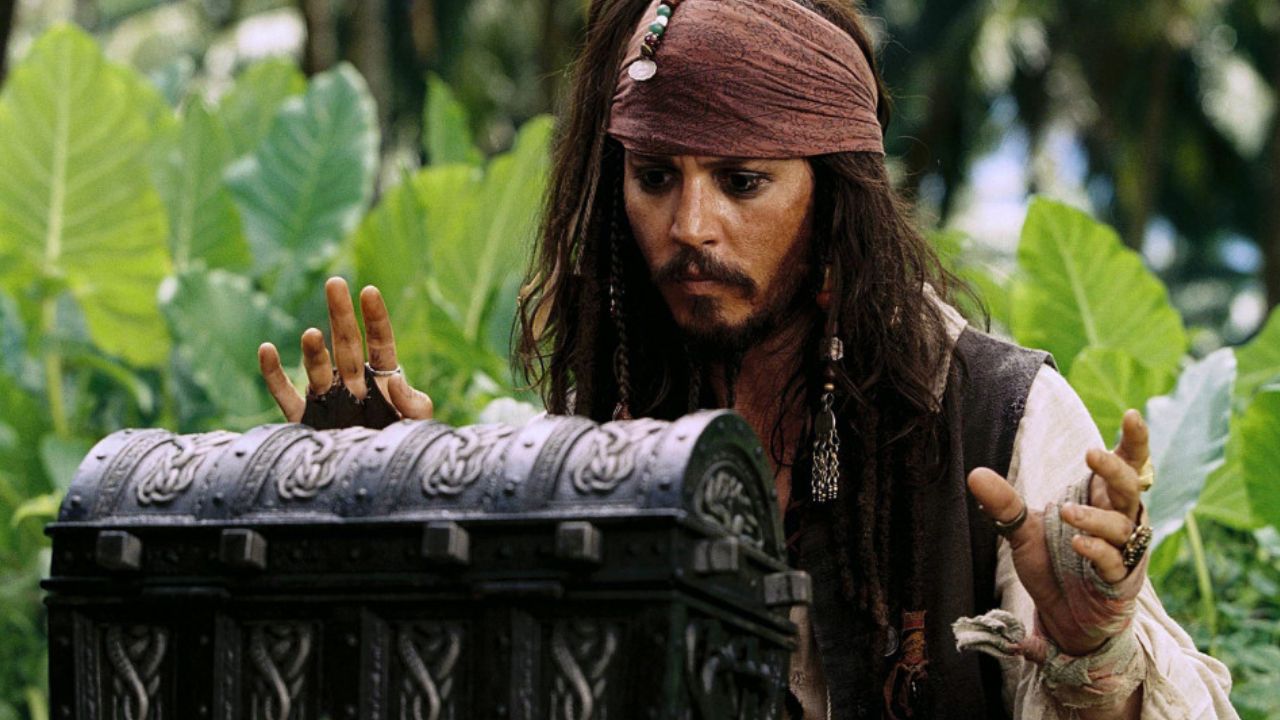 <p>                     Johnny Depp helped make swashbuckling cool again with Disney’s <em>Pirates of the Caribbean</em> movies. The second chapter of the theme park attraction-inspired franchise, <em>Dead Man’s Chest</em>, brought in a lot of <em>booty</em> and conquered the 2006 box office with $423.3 million.                   </p>
