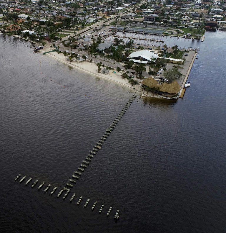 This aerial view of the Cape Coral Yacht Club photographed on Tuesday, June 6, 2023, shows the current state of the facility after suffering the impact of Hurricane Ian.