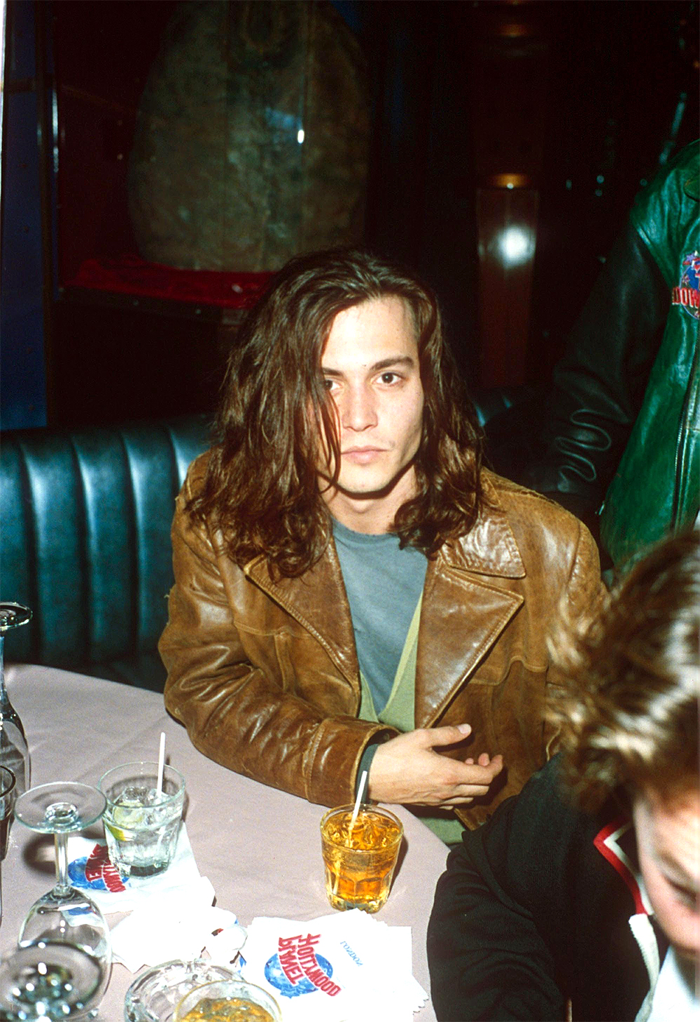 <p>Johnny Depp, seen here sporting his hair from ‘What’s Eating Gilbert Grape’ while at Planet Hollywood in London, Britain, portrayed the title character in the 1993 movie that also featured Darlene Crates, Juliette Lewis, and a 19-year-old Leonardo DiCaprio. It was a well-received movie, bolstered by the soundtrack that featured The Lemonheads’ ‘It’s A Shame About Ray.’</p>