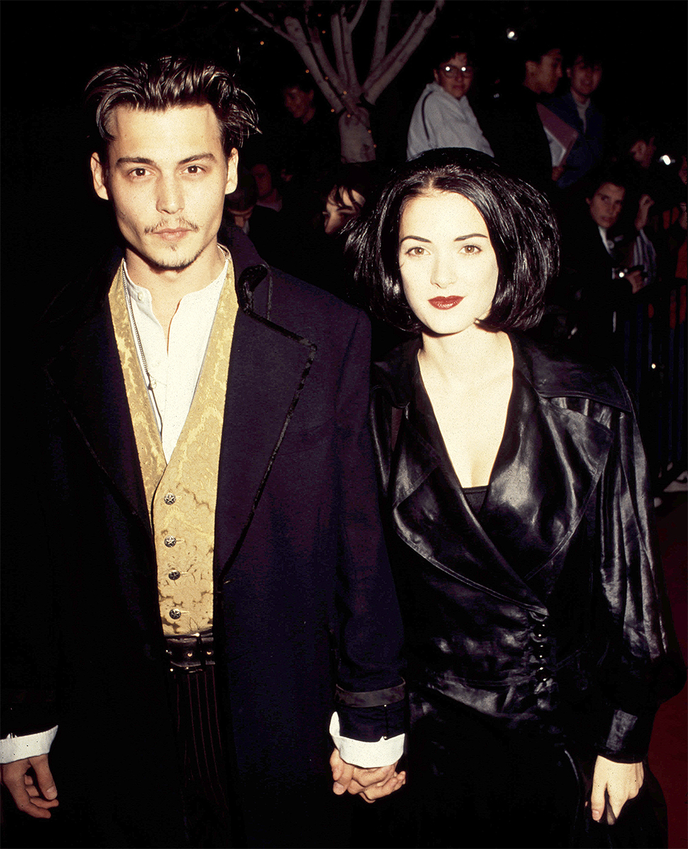 <p>In 1990, Johnny began a relationship that would last for the bulk of his career: he connected with director Tim Burton for the movie ‘Edward Scissorhands.’ The film, released when Johnny was 27, saw him work opposite his then-girlfriend, <a href="https://hollywoodlife.com/feature/winona-ryder-then-and-now-transformation-photos-4361782/">Winona Ryder</a>, seen here with him at the premiere (he proposed after five months of dating, but they split in 1993). Since ‘Scissorhands,’ Johnny has worked with Burton on seemingly an endless number of films.</p>