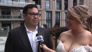 A slam dunk wedding: Colorado couple gets married overlooking McGregor Square watch party