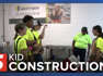 Given the chance to work with tools, middle school students work construction