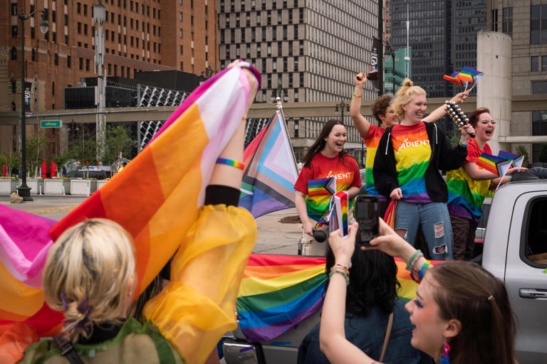 Parade-goers cheer while participating in the annual Motor City Pride Parade in downtown Detroit on Sunday, June 11, 2023.