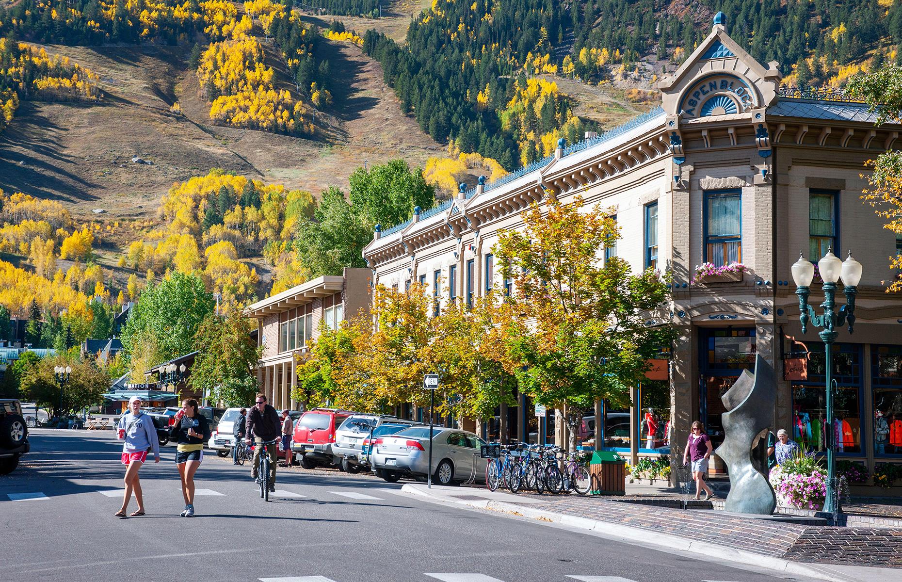 <p>This picturesque mountain town might be better known as a ski resort, but it attracts year-round visitors for hikes through lush summer meadows and leaf-peeping in fall. It's all easily done without wheels as its downtown area is extremely compact, and <a href="https://www.aspen.gov/279/Aspens-Free-Shuttles">free local shuttles</a> connect the city center with nearby neighborhoods and recreational areas. Numerous hiking and biking trails stretch out from Aspen into the wilderness, while Maroon Bells, one of the most photographed mountain ranges in North America, can be accessed via a <a href="https://www.rfta.com/routes/maroon-bells/">short shuttle ride</a>. </p>