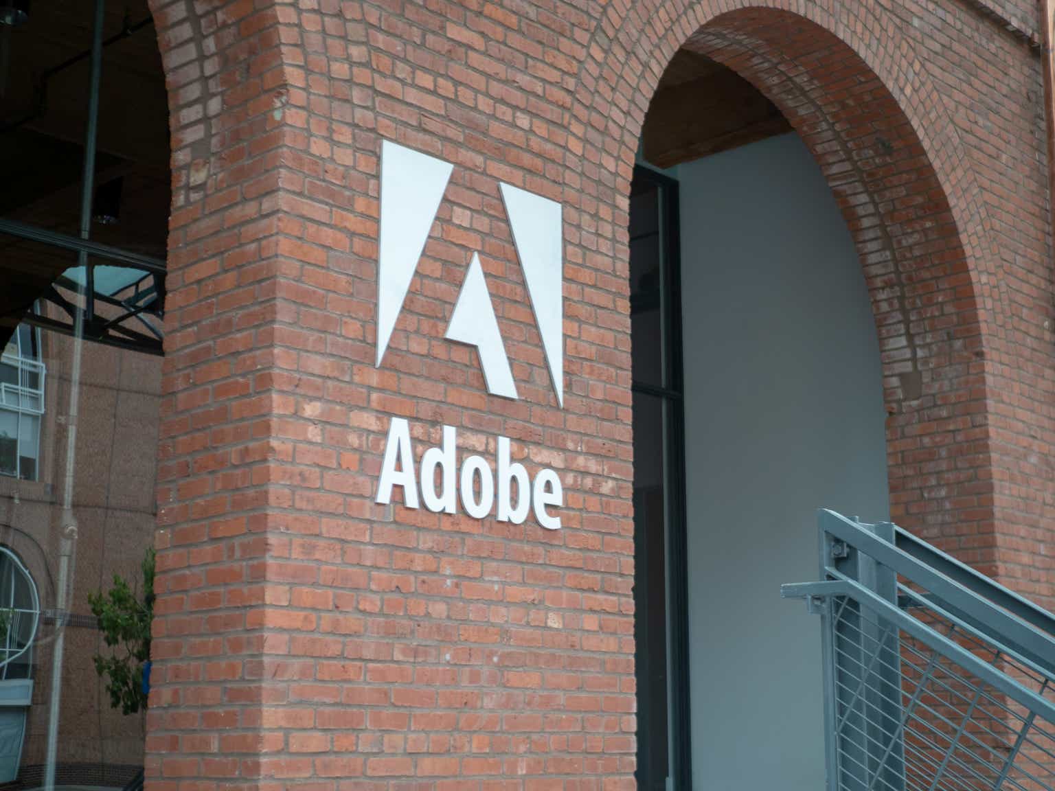 Adobe inches up after completing acquisition of brand visibility ...