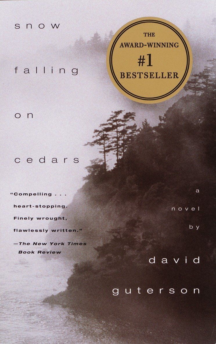 <p>The novel written by David Guterson takes place in 1954, set on San Piedro, a fictional island off the coast of the state of Washington. <em>Snow Falling on Cedars </em>helps to examine <a href="https://www.washington.edu/uwired/outreach/cspn/Website/Classroom%20Materials/Reading%20the%20Region/Aggressive%20Regionalism/Commentary/16.html">the treatment of people of Japanese descent</a> in the Pacific Northwest, following World War II. </p> <p>The 1994 book opens with the trial of Kabuo Miyamoto, a struggling commercial fisherman who is accused of killing another fisherman over a land dispute. The trial must work its way through even though all the players have their visions clouded by their own particular beliefs.</p>