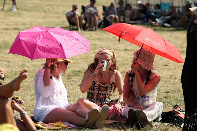 Sunbathers have enjoyed the hot weather at Glastonbury today too (Picture: Tom Wren SWNS)