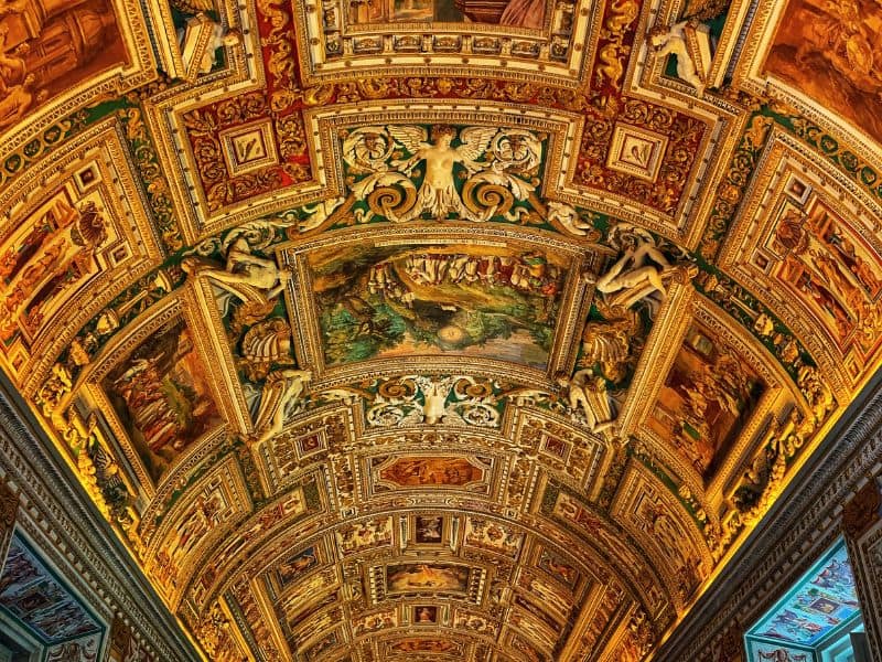 Gorgeous frescoes adorning the majestic Sistine Chapel ceiling, a visual masterpiece in the heart of Rome.