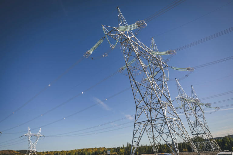 A threat to N.L.'s power grid continues on Tuesday with forest fires burning near key transmission lines that bring electricity into the province.