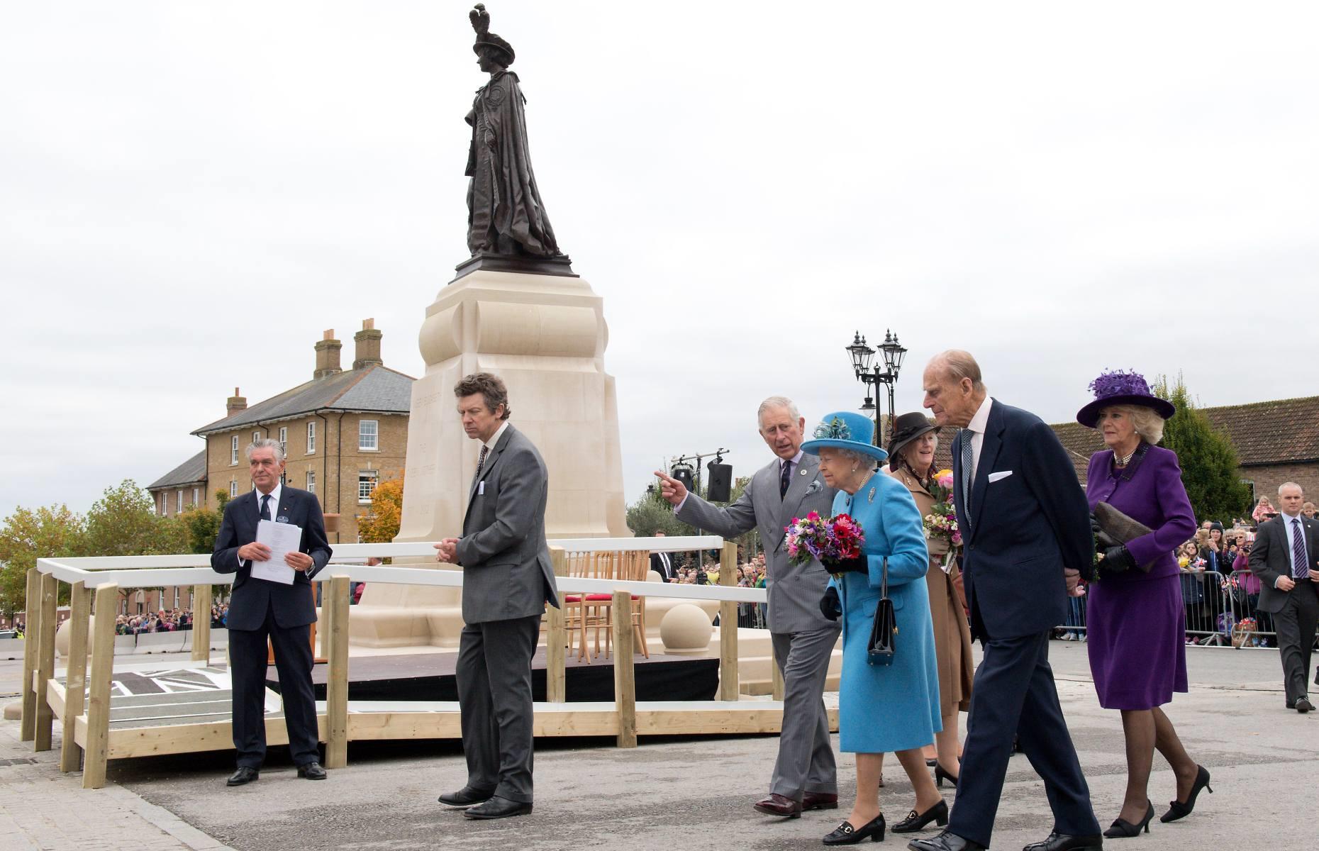 <p>In 1988, he commissioned the visionary urban theorist <a href="https://www.theguardian.com/artanddesign/2011/jun/24/prince-charles-influence-architecture-poundbury">Leon Krier</a> (standing to the left of the King in this image) to produce a plan for developing Poundbury. His brief was to create an autonomous extension to the nearby town of Dorchester blending in with traditional <a href="https://www.loveproperty.com/news/76639/dreamy-dorset-homes-for-sale-right-now">Dorset </a>architecture, using the urban design principles described in <em>A Vision of Britain.</em> The overall design reflects a traditional English village with a mix of residential, commercial and retail spaces, all within easy walking distance.</p>