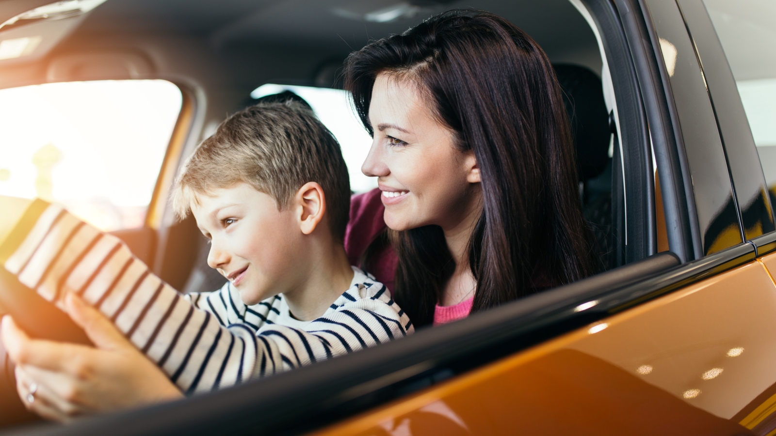 Почему машины родители. Подарить машину родителям. Как выглядят машины родители. Driving a car with a child. A woman and son buying a car.